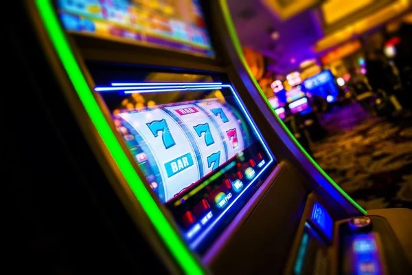 Caishen Wins slot game interface on hokihoki login showing reels and bonus symbols